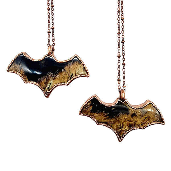 Fossilized Palm Wood Bat Necklace