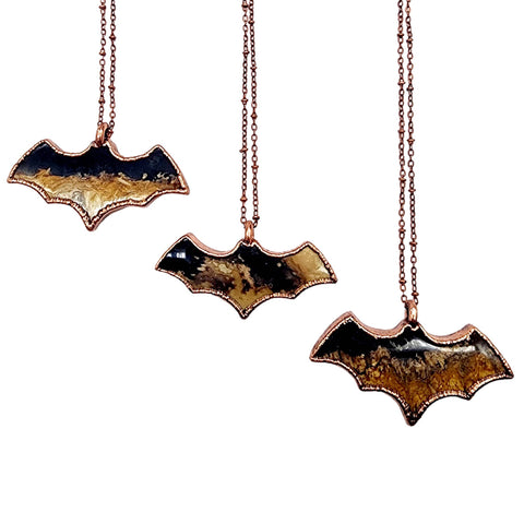 Fossilized Palm Wood Bat Necklace