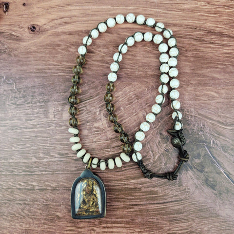 Encased Sitting Buddha Pendant Necklace