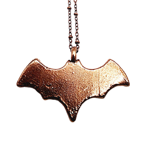 Fossilized Palm Wood Bat Necklace