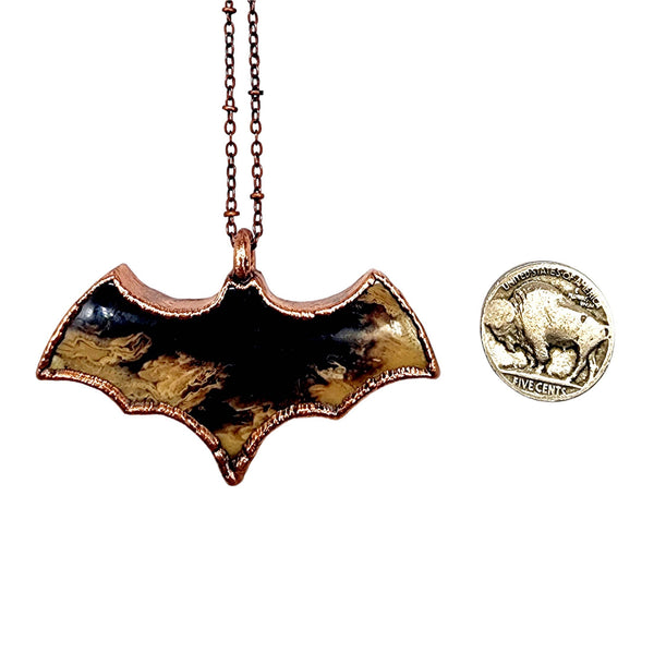 Fossilized Palm Wood Bat Necklace